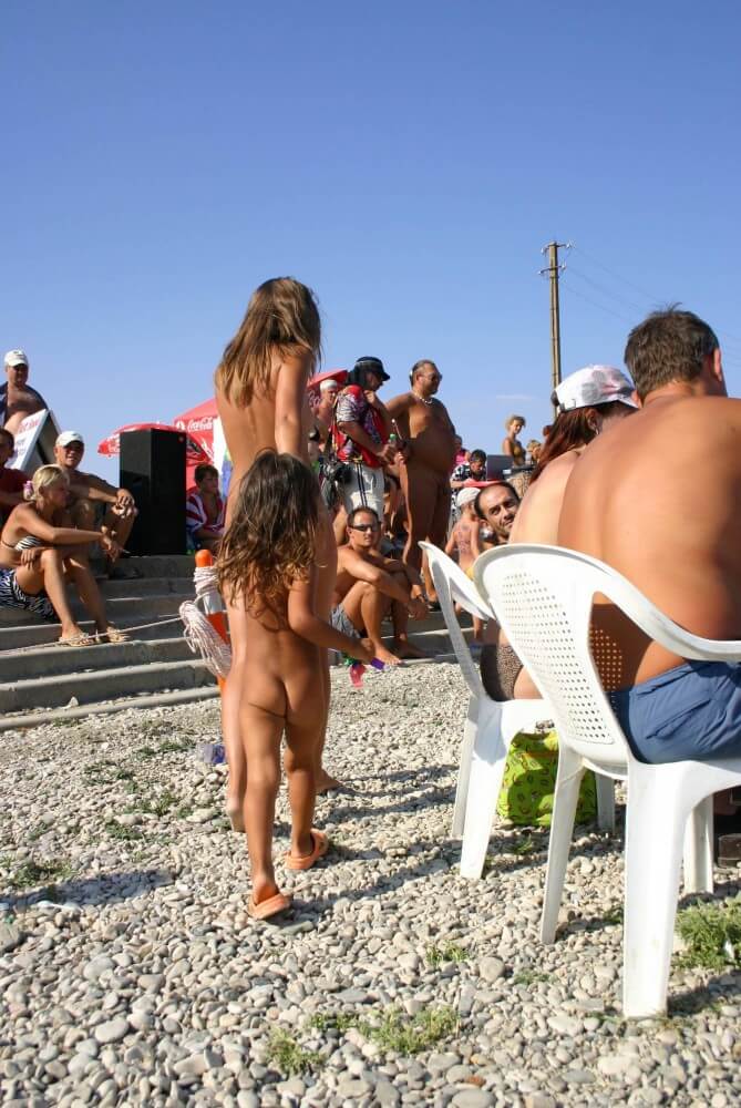 Naturist Standing Sideline - Nudists value simplicity and openness