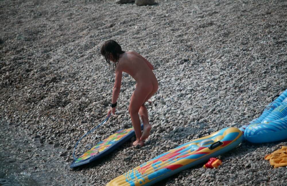 Naturist Surf Board Glides pics - The practice of nudism helps us shed imposed stereotypes and insecurities