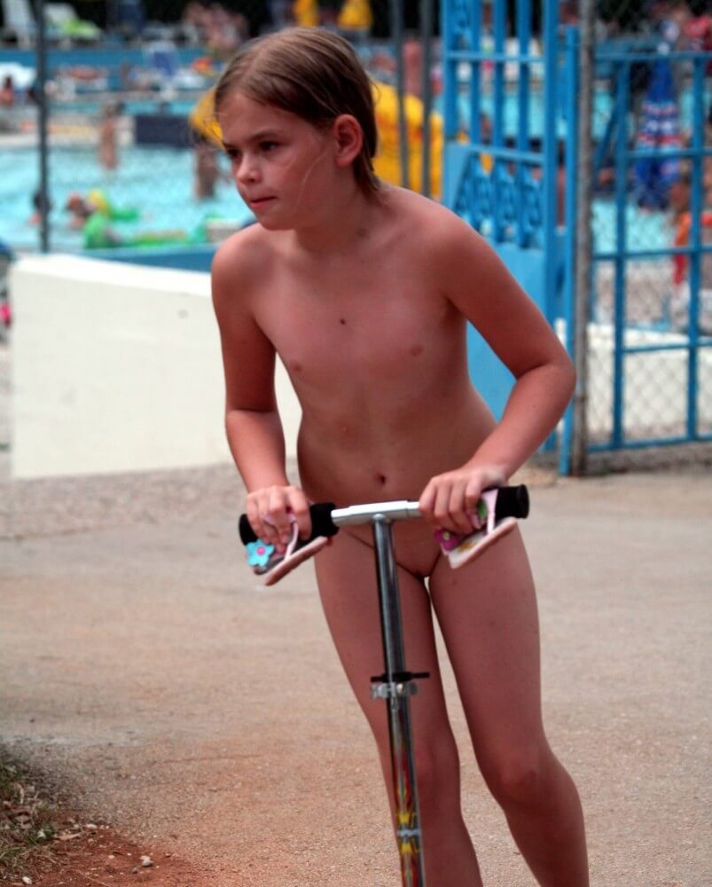 Pool-Side Naturist Scooter pics - Lightheartedness and ease are characteristic features of the practice of nudism and naturism