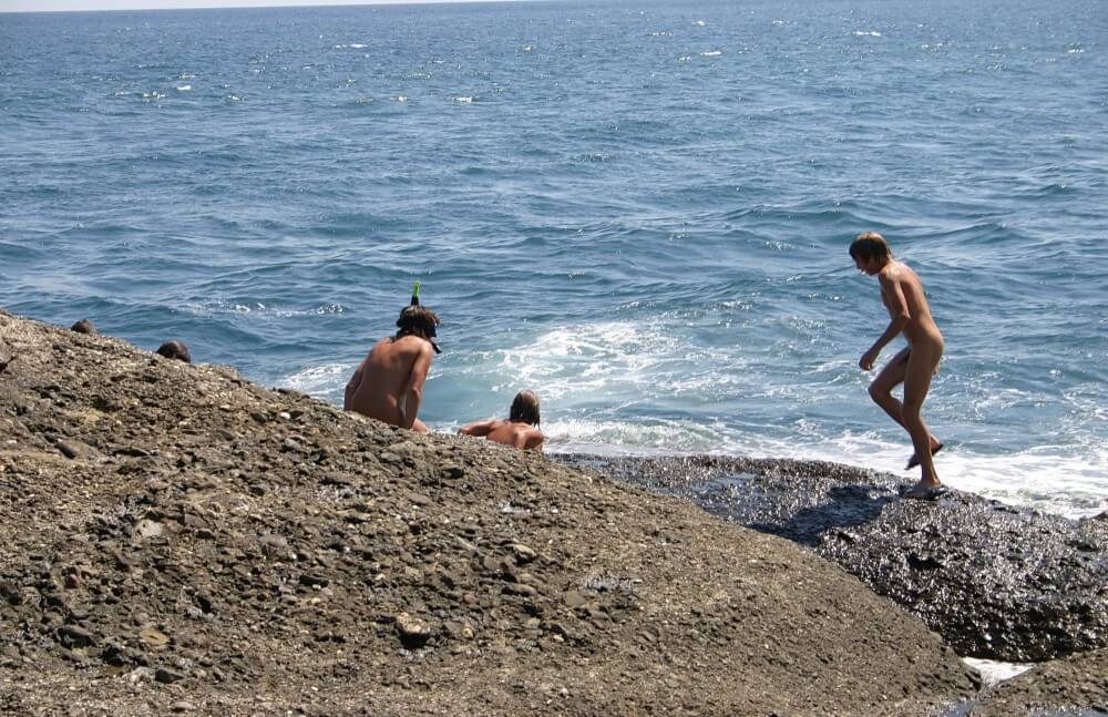 Leaning Against Hit Rocks pics - Naturism is a path to self-understanding and self-acceptance